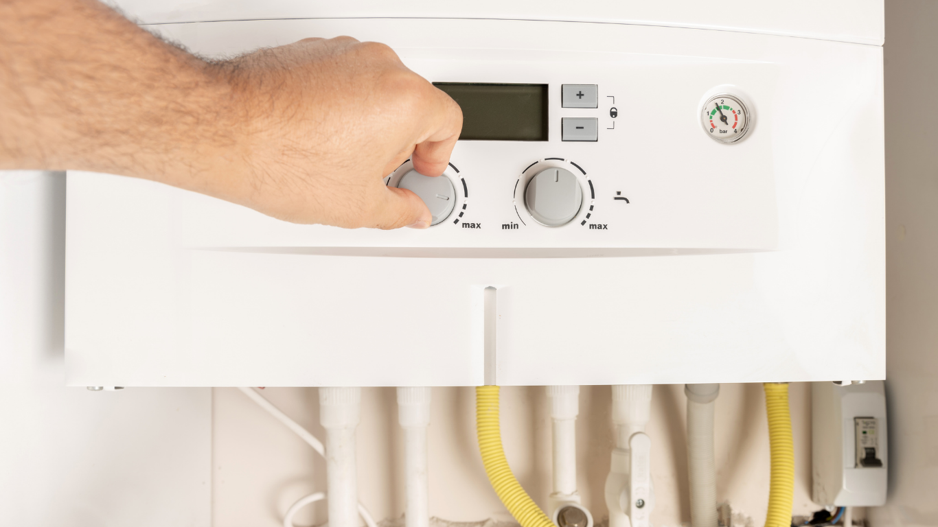Underfloor heating manifold with circulation pump, control valves and connected pipework.